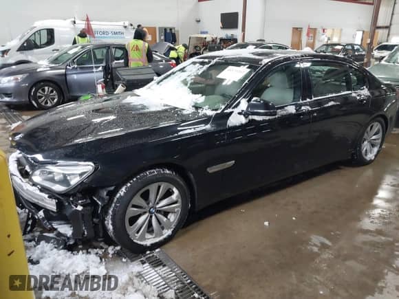 2013 BMW 7 Series 740Li xDrive with VIN WBAYF4C56DD127914, listed as a IAAI auction lot 41370207 with 138,619 mi miles and . Bid and sale history available at DreamBid. Image 21.