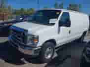 2013 Ford Econoline Cargo Commercial with VIN 1FTSE3EL1DDA83001, listed as a IAAI auction lot 43321266 with 189,068 mi miles and . Bid and sale history available at DreamBid. Image 2.