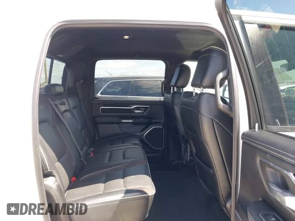 2021 Ram 1500 Laramie with VIN 1C6RREJTXMN704600, listed as a IAAI auction lot 42345097 with 80,180 mi miles and . Bid and sale history available at DreamBid. Image 8.