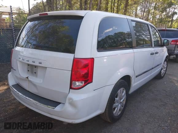 2014 Dodge Grand Caravan SE with VIN 2C4RDGBG3ER335278, listed as a IAAI auction lot 42049346 with 100,813 mi miles and . Bid and sale history available at DreamBid. Image 4.