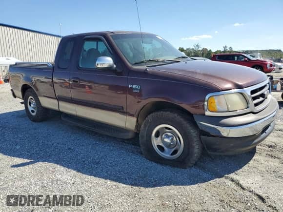 2000 Ford F-150 XL z VIN 1FTRX17W6YKA41445, wystawiony jako Copart lot #85125655 z przebiegiem 293 500 mil mil oraz Szkoda całkowita • Salvage title. Historia ofert i sprzedaży dostępna na DreamBid. Obrazek 4.