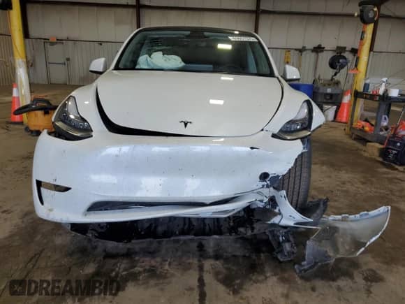 2023 Tesla Model Y Long Range z VIN 7SAYGDEE0PA103666, wystawiony jako Copart lot #69051375 z przebiegiem 42 304 mil mil oraz Szkoda całkowita • Salvage title. Historia ofert i sprzedaży dostępna na DreamBid. Obrazek 5.