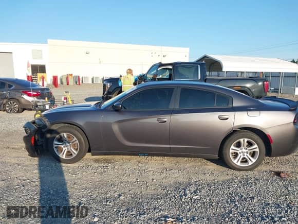 2019 Dodge Charger SXT with VIN 2C3CDXBG6KH664746, listed as a IAAI auction lot 43072542 with 105,972 mi miles and . Bid and sale history available at DreamBid. Image 14.