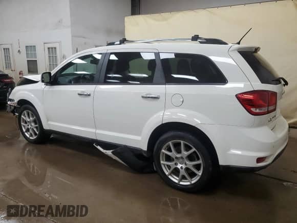 2014 Dodge Journey R/T with VIN 3C4PDDFG2ET108242, listed as a Copart auction lot 63001485 with 161,325 mi miles and Clean title. Bid and sale history available at DreamBid. Image 2.