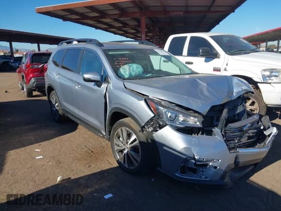 2022 Subaru Ascent Limited z VIN 4S4WMALD3N3440055, wystawiony jako IAAI lot #38799471 z przebiegiem 21 477 mil mil oraz . Historia ofert i sprzedaży dostępna na DreamBid. Obrazek 1.