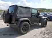2016 Jeep Wrangler Willys Wheeler z VIN 1C4AJWAGXGL338868, wystawiony jako Copart lot #81030205 z przebiegiem 143 686 mil mil oraz Szkoda całkowita • Salvage title. Historia ofert i sprzedaży dostępna na DreamBid. Obrazek 3.