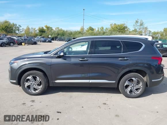 2021 Hyundai Santa Fe SEL z VIN 5NMS3DAJ0MH345114, wystawiony jako IAAI lot #43343253 z przebiegiem 52 092 mil mil oraz . Historia ofert i sprzedaży dostępna na DreamBid. Obrazek 14.