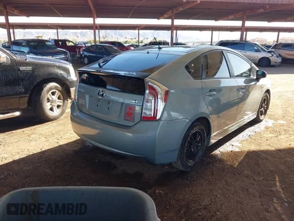 2015 Toyota Prius Four z VIN JTDKN3DU1F1895543, wystawiony jako IAAI lot #43390029 z przebiegiem 215 692 mil mil oraz . Historia ofert i sprzedaży dostępna na DreamBid. Obrazek 4.