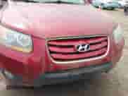 2010 Hyundai Santa Fe Limited z VIN 5NMSKDAG2AH355503, wystawiony jako IAAI lot #42459396 z przebiegiem 163 728 mil mil oraz . Historia ofert i sprzedaży dostępna na DreamBid. Obrazek 6.