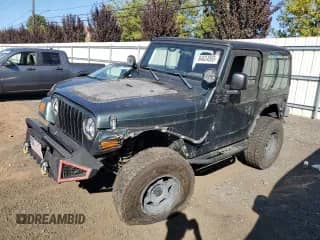 2004 Jeep Wrangler SE z VIN 1J4FA29144P772653, wystawiony jako Copart lot #84624065 z przebiegiem 121 937 mil mil oraz Szkoda całkowita • Salvage title. Historia ofert i sprzedaży dostępna na DreamBid. Obrazek 1.