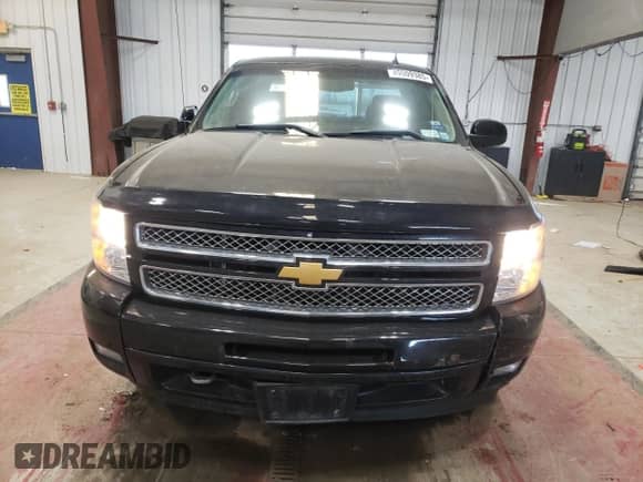 2013 Chevrolet Silverado 1500 LTZ z VIN 1GCRKTE72DZ414083, wystawiony jako Copart lot #49009385 z przebiegiem 180 241 mil mil oraz Szkoda całkowita • Salvage title. Historia ofert i sprzedaży dostępna na DreamBid. Obrazek 5.