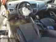 2013 Hyundai Veloster w/Black Int с VIN KMHTC6AD9DU094754, выставлен на аукционе Copart как лот 64644975 с пробегом 165 871 миль миль и Списание • Salvage title. История ставок и продаж доступна на DreamBid. Изображение 8.