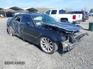 2006 Chrysler 300 C SRT-8 with VIN 2C3LA73W36H509656, listed as a IAAI auction lot 41852179 with 92,209 mi miles and . Bid and sale history available at DreamBid. Image 1.