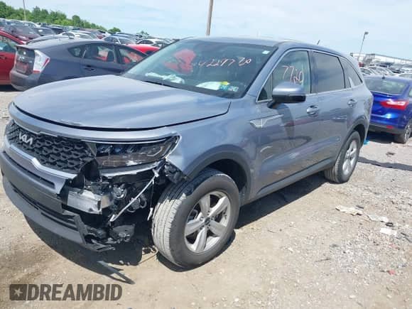 2023 Kia Sorento LX with VIN 5XYRGDLC9PG240958, listed as a IAAI auction lot 42297720 with 27,485 mi miles and . Bid and sale history available at DreamBid. Image 2.