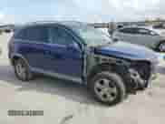 2013 Chevrolet Captiva Sport LS with VIN 3GNAL2EK9DS574054, listed as a Copart auction lot 78574134 with 239,388 mi miles and Salvage title. Bid and sale history available at DreamBid. Image 4.