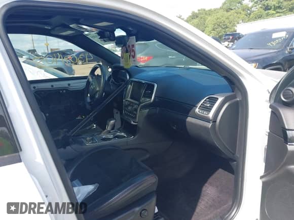 2017 Jeep Grand Cherokee Trailhawk z VIN 1C4RJFLT4HC761671, wystawiony jako IAAI lot #43091405 z przebiegiem 72 110 mil mil oraz . Historia ofert i sprzedaży dostępna na DreamBid. Obrazek 5.