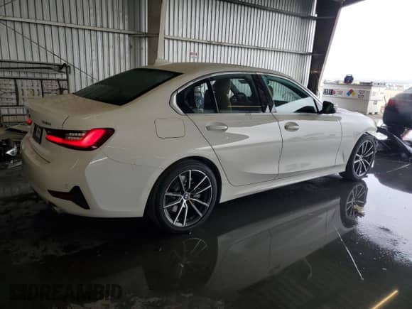 2019 BMW 3 Series 330i with VIN WBA5R1C54KAK12564, listed as a Copart auction lot 87452615 with 49,169 mi miles and Salvage title. Bid and sale history available at DreamBid. Image 3.