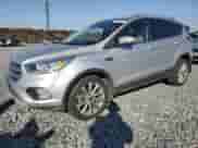 2017 Ford Escape Titanium z VIN 1FMCU0JD2HUE74535, wystawiony jako Copart lot #89677855 z przebiegiem 160 102 mil mil oraz Czysty tytuł • Clean title. Historia ofert i sprzedaży dostępna na DreamBid. Obrazek 1.