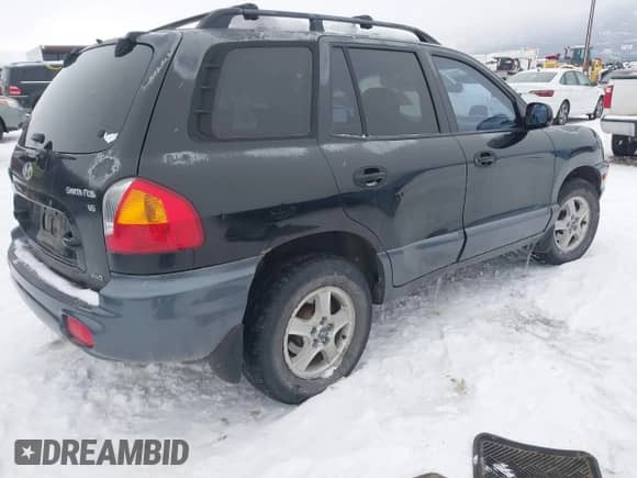 2003 Hyundai Santa Fe GLS z VIN KM8SC73D13U360684, wystawiony jako IAAI lot #41489092 z przebiegiem 108 721 mil mil oraz . Historia ofert i sprzedaży dostępna na DreamBid. Obrazek 4.