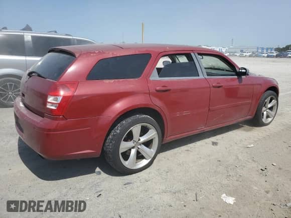 2005 Dodge Magnum SXT with VIN 2D8GZ48V95H537711, listed as a Copart auction lot 58904545 with Not provided miles and Salvage title. Bid and sale history available at DreamBid. Image 3.