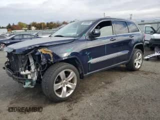2012 Jeep Grand Cherokee Laredo with VIN 1C4RJFAGXCC272254, listed as a Copart auction lot 90065865 with 69,373 mi miles and Salvage title. Bid and sale history available at DreamBid. Image 1.
