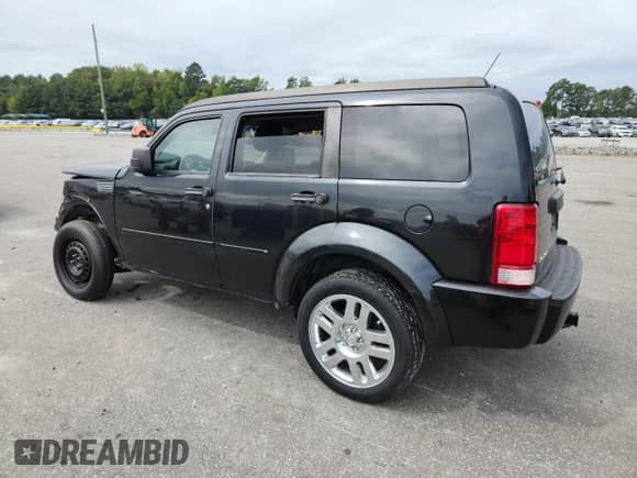 2011 Dodge Nitro Heat with VIN 1D4PT4GK0BW606180, listed as a Copart auction lot 71903985 with 135,991 mi miles and Salvage title. Bid and sale history available at DreamBid. Image 2.