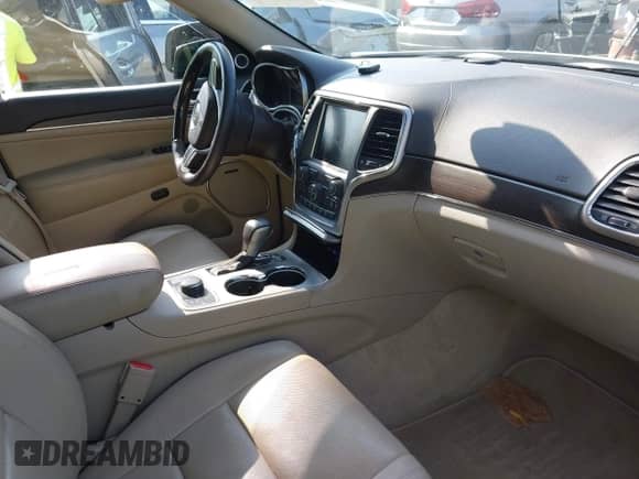 2017 Jeep Grand Cherokee Overland with VIN 1C4RJFCG1HC633004, listed as a IAAI auction lot 42672905 with 138,018 mi miles and . Bid and sale history available at DreamBid. Image 5.