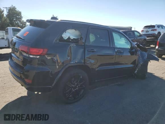 2019 Jeep Grand Cherokee Altitude with VIN 1C4RJFAG9KC670344, listed as a Copart auction lot 87227335 with 152,502 mi miles and Salvage title. Bid and sale history available at DreamBid. Image 3.