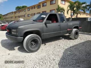 1996 GMC Sierra 1500 with VIN 2GTEC19W9T1523701, listed as a Copart auction lot 53850445 with 252,685 mi miles and Salvage title. Bid and sale history available at DreamBid. Image 1.