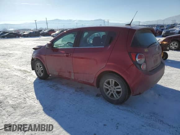 2012 Chevrolet Sonic LT with VIN 1G1JC6SH6C4143008, listed as a Copart auction lot 42904085 with 97,472 mi miles and Salvage title. Bid and sale history available at DreamBid. Image 2.
