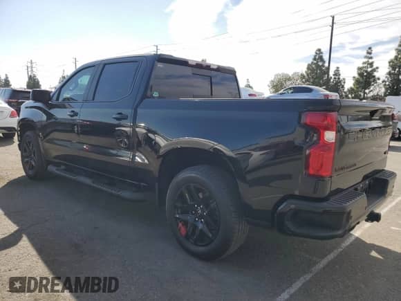 2022 Chevrolet Silverado 1500 RST with VIN 1GCPWDED5NZ142606, listed as a Copart auction lot 79077014 with 26,769 mi miles and Salvage title. Bid and sale history available at DreamBid. Image 2.