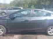 2017 Chevrolet Cruze LT z VIN 3G1BE6SM3HS554966, wystawiony jako IAAI lot #43252261 z przebiegiem 172 023 mil mil oraz . Historia ofert i sprzedaży dostępna na DreamBid. Obrazek 14.