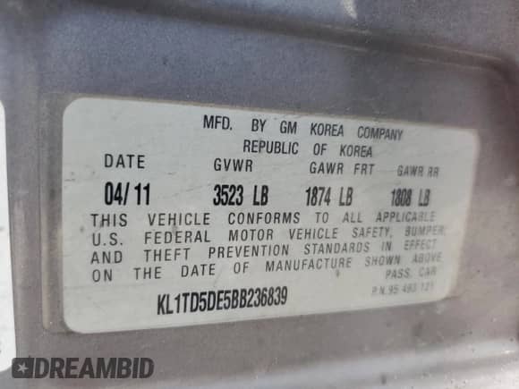 2011 Chevrolet Aveo 1LT z VIN KL1TD5DE5BB236839, wystawiony jako Copart lot #81154805 z przebiegiem 156 495 mil mil oraz Szkoda całkowita • Salvage title. Historia ofert i sprzedaży dostępna na DreamBid. Obrazek 12.