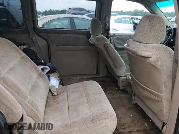 1999 Honda Odyssey LX with VIN 2HKRL1859XH501924, listed as a Copart auction lot 60996743 with 254,512 mi miles and Salvage title. Bid and sale history available at DreamBid. Image 11.