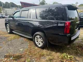 2019 Chevrolet Suburban LT with VIN 1GNSKHKC2KR218438, listed as a Copart auction lot 87029865 with 218,915 mi miles and Clean title. Bid and sale history available at DreamBid. Image 2.
