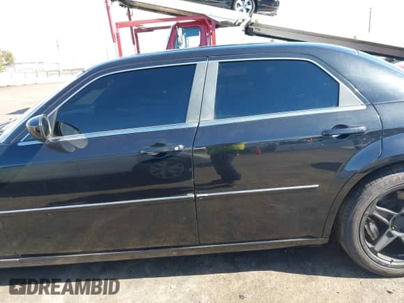 2006 Chrysler 300 C SRT-8 with VIN 2C3LA73W86H388896, listed as a IAAI auction lot 40599030 with 152,547 mi miles and . Bid and sale history available at DreamBid. Image 14.