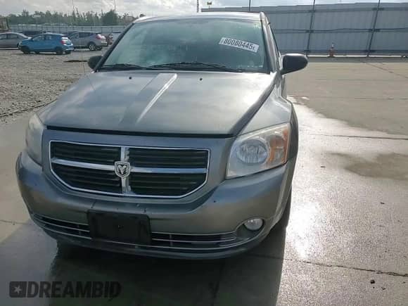 2012 Dodge Caliber SXT с VIN 1C3CDWDA2CD533928, выставлен на аукционе Copart как лот 80080445 с пробегом 131 862 миль миль и Списание • Salvage title. История ставок и продаж доступна на DreamBid. Изображение 13.