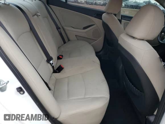2014 Kia Optima LX с VIN KNAGM4A73E5475543, выставлен на аукционе Copart как лот 72706484 с пробегом 124 533 миль миль и Списание • Salvage title. История ставок и продаж доступна на DreamBid. Изображение 10.