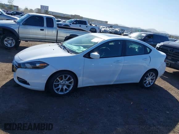 2013 Dodge Dart SXT with VIN 1C3CDFBA2DD268111, listed as a IAAI auction lot 41809436 with 124,589 mi miles and . Bid and sale history available at DreamBid. Image 14.