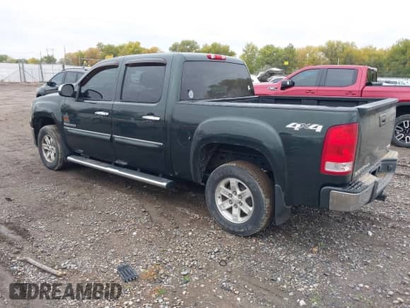 2013 GMC Sierra 1500 SLE z VIN 3GTP2VE75DG231117, wystawiony jako IAAI lot #43475156 z przebiegiem 99 209 mil mil oraz . Historia ofert i sprzedaży dostępna na DreamBid. Obrazek 3.