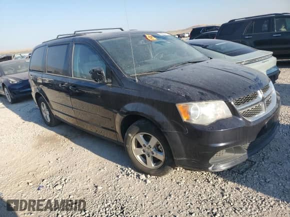 2011 Dodge Grand Caravan Mainstreet with VIN 2D4RN3DG9BR602537, listed as a Copart auction lot 65924415 with 183,418 mi miles and Salvage title. Bid and sale history available at DreamBid. Image 4.