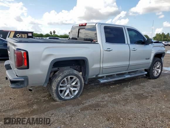 2018 GMC Sierra 1500 SLT with VIN 3GTU2NEC4JG476227, listed as a Copart auction lot 86170085 with 171,910 mi miles and Salvage title. Bid and sale history available at DreamBid. Image 3.