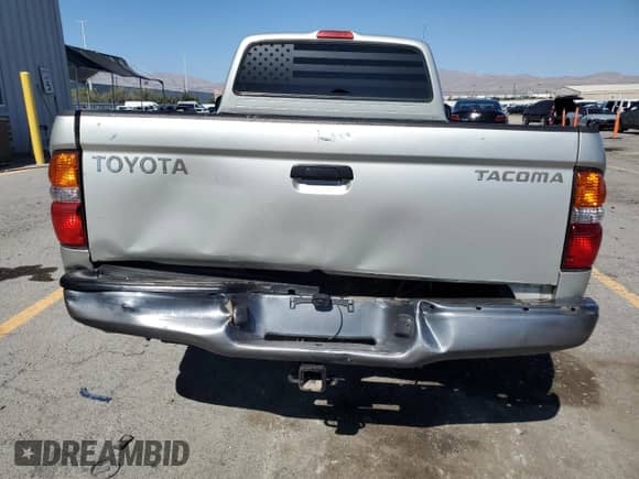 2003 Toyota Tacoma with VIN 5TENL42N23Z227479, listed as a Copart auction lot 85126975 with 177,129 mi miles and Salvage title. Bid and sale history available at DreamBid. Image 6.