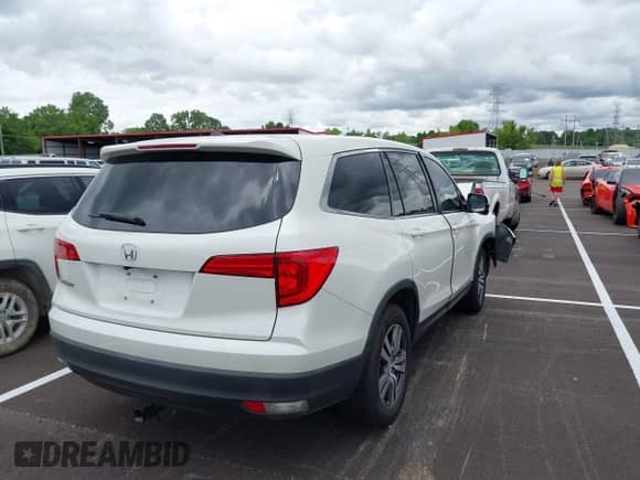 2017 Honda Pilot EX-L with VIN 5FNYF5H50HB002326, listed as a IAAI auction lot 42356845 with 101,098 mi miles and . Bid and sale history available at DreamBid. Image 4.
