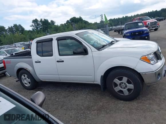 2007 Nissan Frontier Nismo with VIN 1N6AD07W17C438468, listed as a IAAI auction lot 42865514 with 122,822 mi miles and . Bid and sale history available at DreamBid. Image 13.