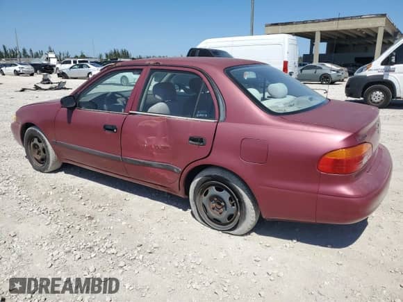 2002 Chevrolet Prizm z VIN 1Y1SK52812Z402087, wystawiony jako Copart lot #53066765 z przebiegiem Nie podano mil oraz Szkoda całkowita • Salvage title. Historia ofert i sprzedaży dostępna na DreamBid. Obrazek 2.