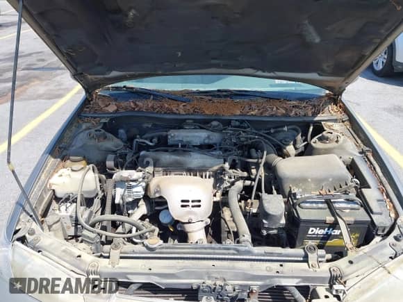 1997 Toyota Camry LE z VIN 4T1BG22KXVU063763, wystawiony jako IAAI lot #42149688 z przebiegiem 221 909 mil mil oraz . Historia ofert i sprzedaży dostępna na DreamBid. Obrazek 10.