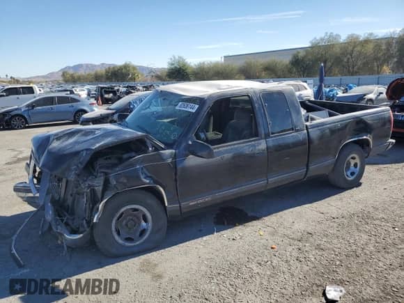 1998 GMC Sierra 1500 z VIN 2GTEC19M2W1506886, wystawiony jako Copart lot #82636144 z przebiegiem 113 755 mil mil oraz Szkoda całkowita • Salvage title. Historia ofert i sprzedaży dostępna na DreamBid. Obrazek 1.