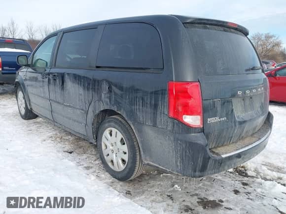2014 Dodge Grand Caravan SXT with VIN 2C4RDGBGXER138141, listed as a IAAI auction lot 41201505 with 156,445 mi miles and . Bid and sale history available at DreamBid. Image 3.