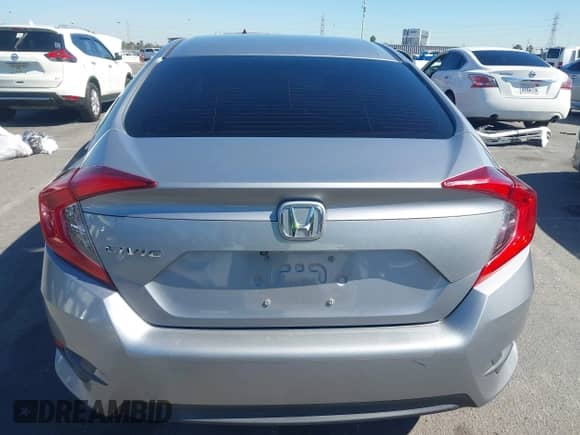 2016 Honda Civic LX z VIN 2HGFC2F52GH551120, wystawiony jako IAAI lot #43463855 z przebiegiem 121 110 mil mil oraz . Historia ofert i sprzedaży dostępna na DreamBid. Obrazek 16.